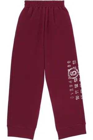 Maison Margiela Pantalones de chándal con motivo de números