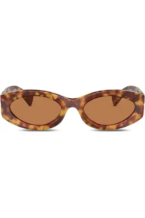 Miu Miu Gafas de sol cat eye con efecto de carey