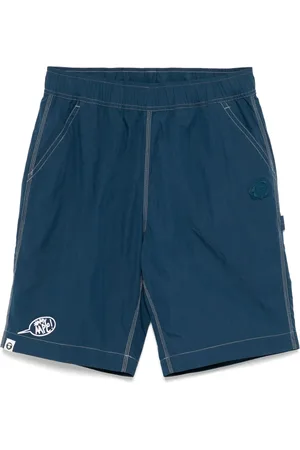 A Bathing Ape Bermudas con parche del logo