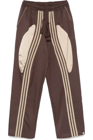 SONG FOR THE MUTE Pantalones tejidos de x adidas