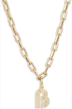 Adina Reyter Colgante Initial en oro amarillo de 14 ct con diamante