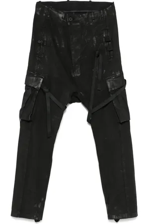 11 BY BORIS BIDJAN SABERI Pantalones con efecto envejecido