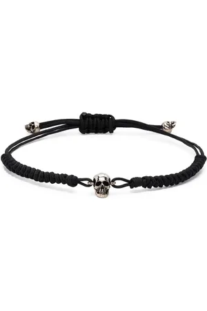 Alexander McQueen Pulsera con charm de calavera