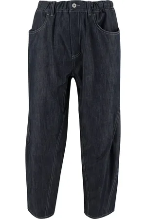 and wander Cotton-blend jeans