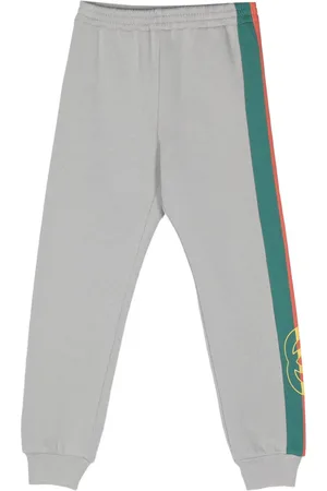 Gucci Pantalones de chándal con logo estampado