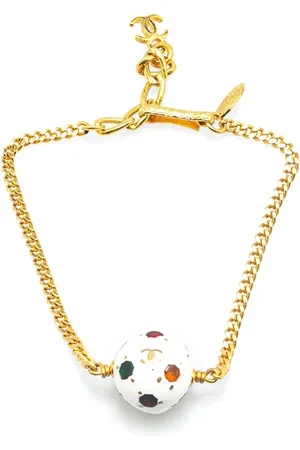 CHANEL Pulsera bañada en oro con charm de bola de fútbol 1998