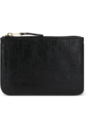 Comme des Garçons Cartera con motivos en relieve