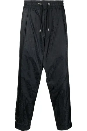 Balmain Pantalones acampanados con monograma