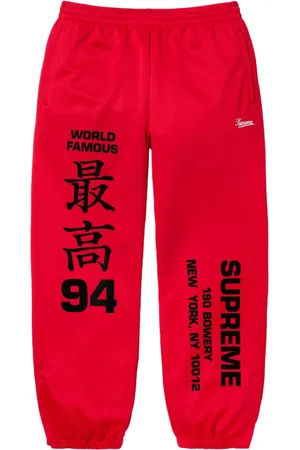 Supreme Pantalones de chándal Worldwide SS 25 - Red