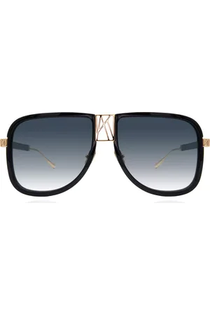ANNA KARIN KARLSSON LOGO DUDE Negras Gafas de Sol para Mujer Dorados