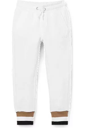HUGO BOSS Niñas Chándals - Pantalones de chándal para niños en algodón con rayas de la marca en los puños