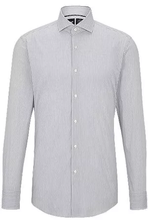 HUGO BOSS Hombre De rayas - Camisa slim fit de tejido elástico técnico de rayas