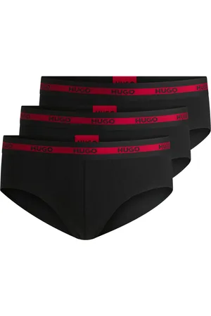 HUGO BOSS Paquete de tres calzoncillos slip de algodón elástico con logos en la cintura