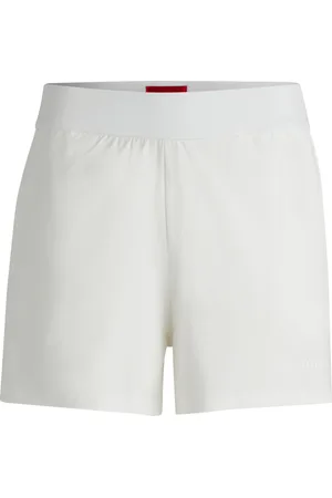 HUGO BOSS Shorts relaxed fit de punto elástico con logo estampado
