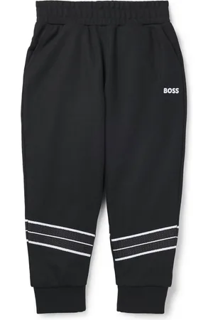 HUGO BOSS Pantalones de chándal tapered fit para niños con ribetes de espiga