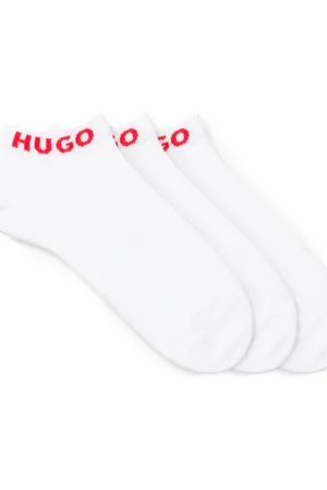 HUGO BOSS Paquete de tres pares de calcetines tobilleros con logos en los puños