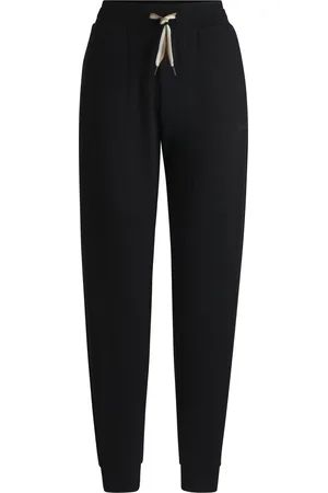 HUGO BOSS Pantalones de chándal con puños y rayas de la marca en el cordón