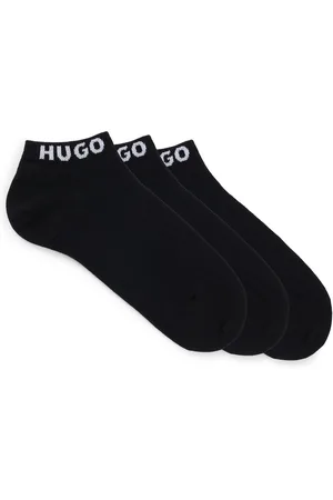 HUGO BOSS Paquete de tres pares de calcetines tobilleros con logos en los puños