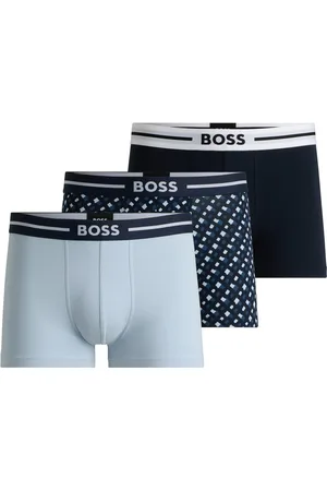 HUGO BOSS Paquete de tres calzoncillos de algodón elástico en diseños lisos y con monogramas