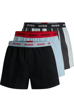 HUGO BOSS Paquete de tres calzoncillos bóxer de algodón con logos en la cintura