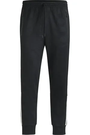 HUGO BOSS Pantalones de chándal relaxed fit con círculos tejidos en jacquard