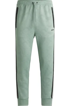 HUGO BOSS Pantalones de chándal relaxed fit con círculos tejidos en jacquard