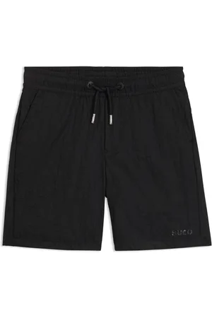 HUGO BOSS Bañador tipo shorts de estilo surfero para niños con logo estampado