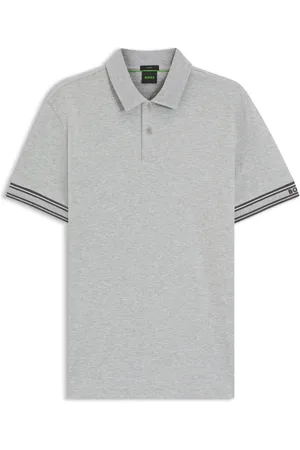 HUGO BOSS Polo slim fit de algodón con puños a rayas