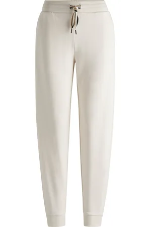 HUGO BOSS Pantalones de chándal con puños y rayas de la marca en el cordón