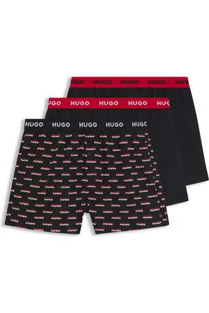 HUGO BOSS Paquete de tres calzoncillos bóxer de algodón con logos en la cintura