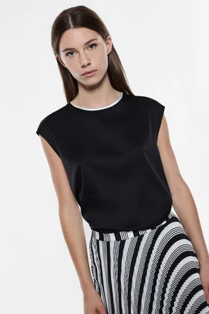 Imperial Top sin mangas con cuello redondo