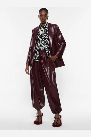 Imperial Pantalones anchos de piel sintética con dobladillo elástico