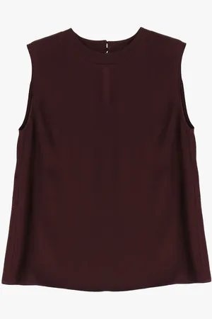 Imperial Top sin mangas con detalle de apertura