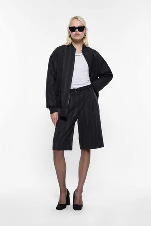 Imperial Shorts a rayas con dobladillos