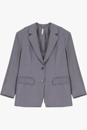 Imperial Blazer con líneas limpias y bolsillos