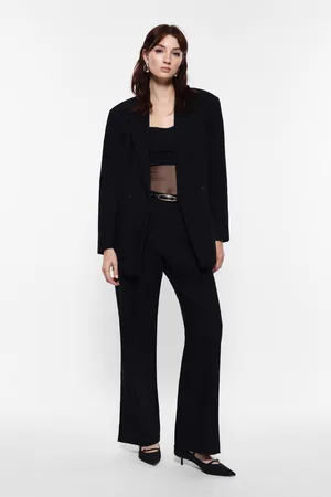 Imperial Pantalones flare cintura media