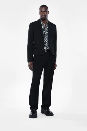 Imperial Pantalones con pinzas y tiro medio