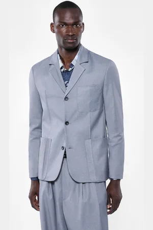 Imperial Blazer con grandes bolsillos y tres botones