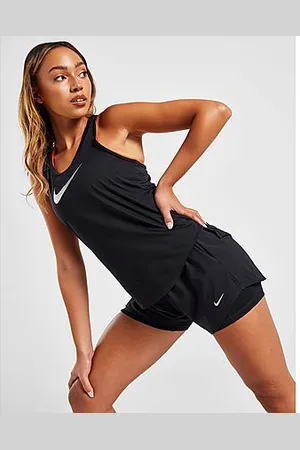 Nike - Camiseta y pantalones cortos para mujer