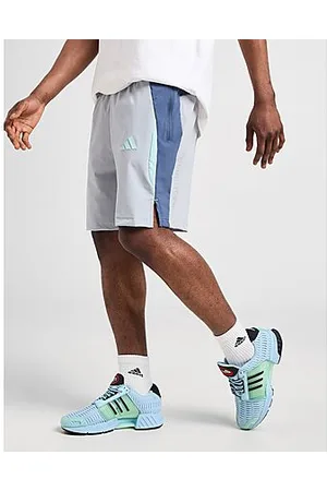 adidas Pantalón corto Tech Apparel Colorblock