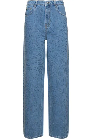 ROTATE Jeans Anchos Lavados En Piedra