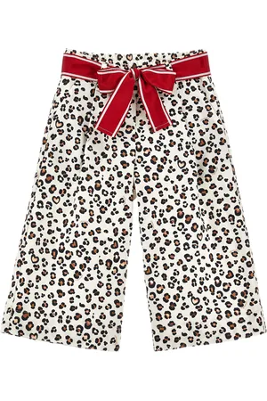 MONNALISA Pantalón gabardina animal print