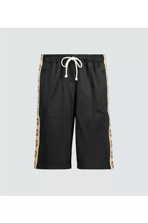 Gucci Pantalones cortos con ribete GG