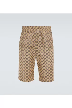 Gucci Shorts de lona GG