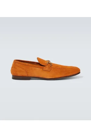 Mocasines Louis Vuitton de color rojo para Hombre - Vestiaire Collective