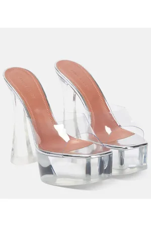 Amina Muaddi Mules Dalida Glass de PVC con plataforma