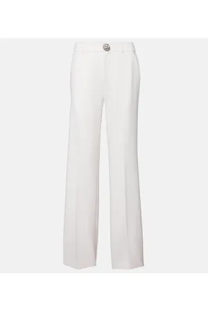 AREA Pantalones flared de lana con aberturas