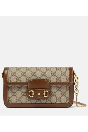 Gucci Bolso Horsebit 1955 Mini de lona GG