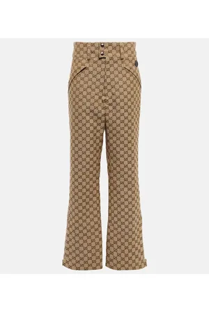 Gucci Pantalones flared GG de lona de algodón