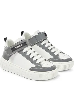 VERSACE Zapatillas altas de piel con logo